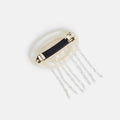 Hair comb with a black band on a white background