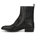 Black crocodile-patterned boot on a white background