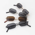 Collection of various sunglasses on a white background