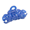 A translucent blue plastic claw hair clip on a solid white background.