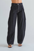 Dark blue wide-leg jeans on a plain background