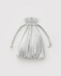 Silver pleated drawstring bag on a light gray background