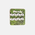Product packaging with 'Chunks' branding on a grassy background