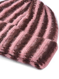 Pink textured fabric on a white background