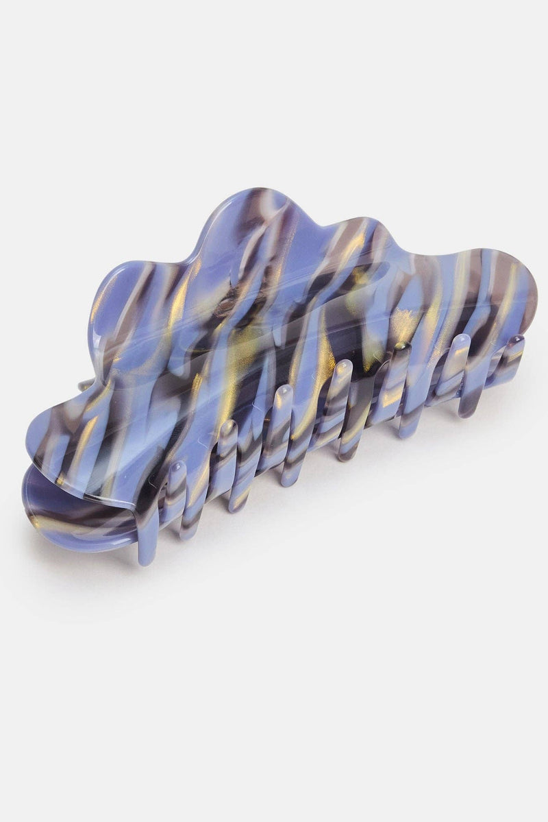 Blue and purple wavy hair clip on a white background