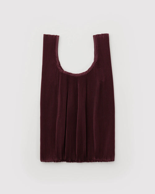 burgundy pleated bag on light grey background