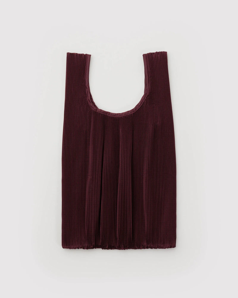 burgundy pleated bag on light grey background